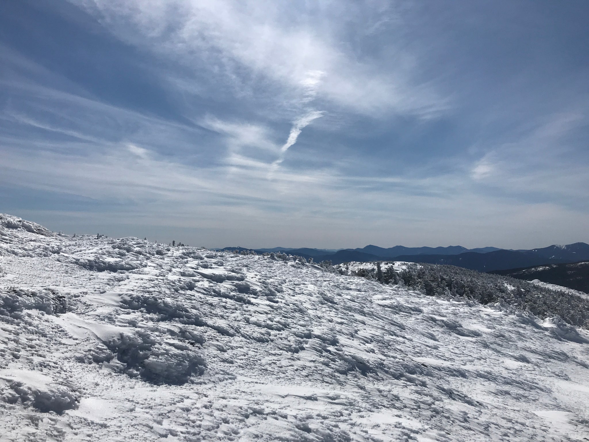 Snowy, wind-gusted mountain top