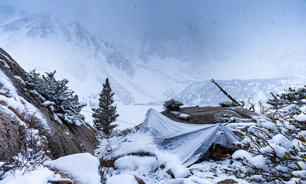 Camping on the way to the Palisades Glacier in a snowstorm.