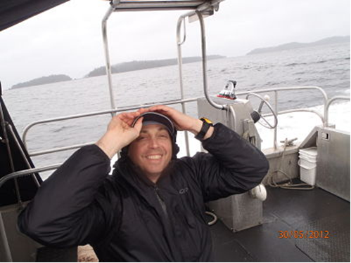 Smiling man on fishing boat