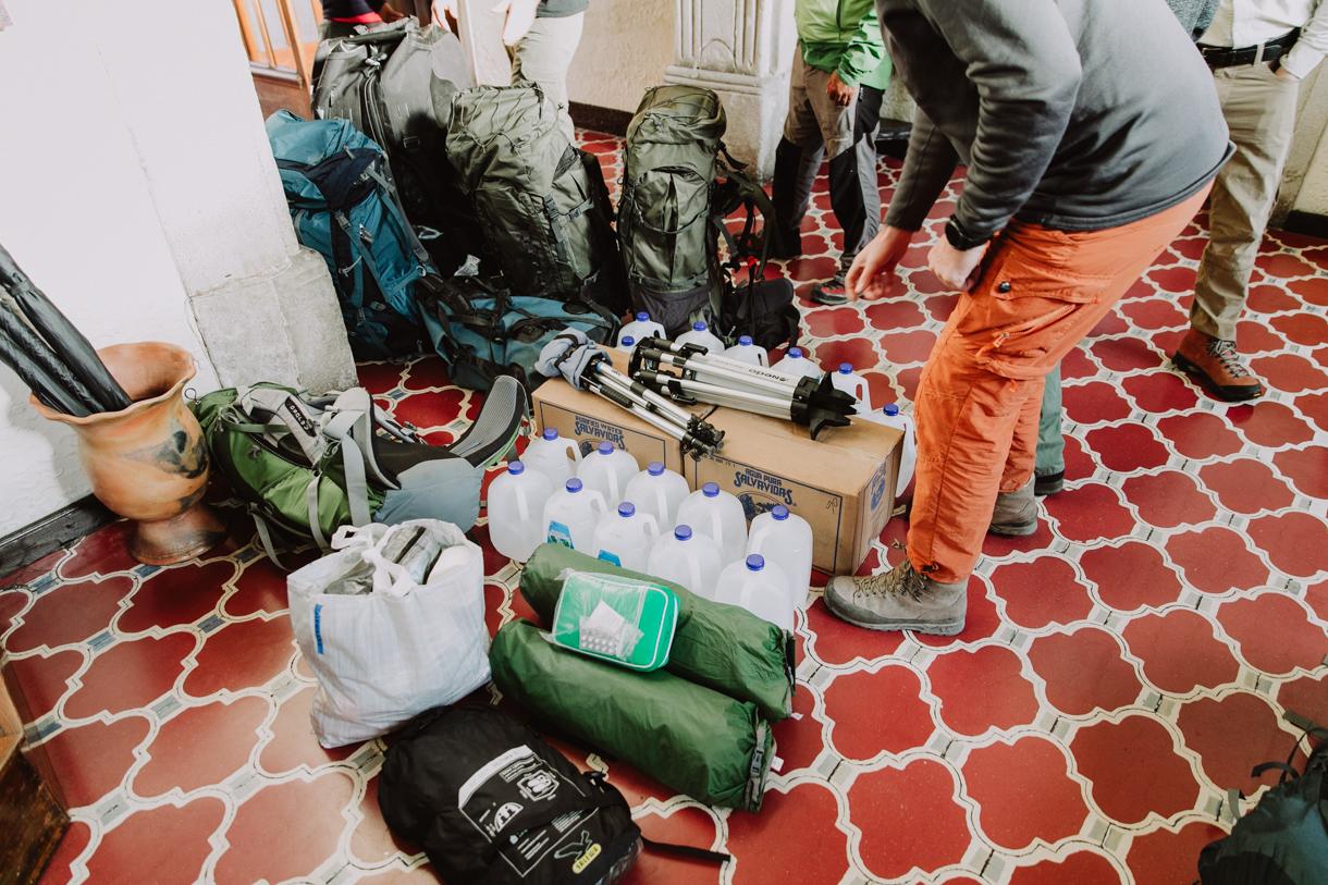 Ultralight backpacking gear spread on floor