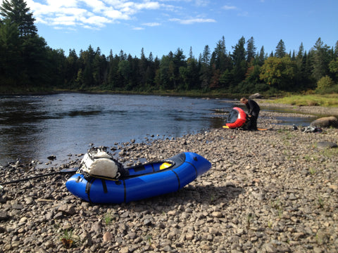 Ultralight packrafts on a backcountry riverbank