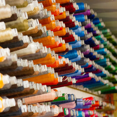 embroidery threads on spools