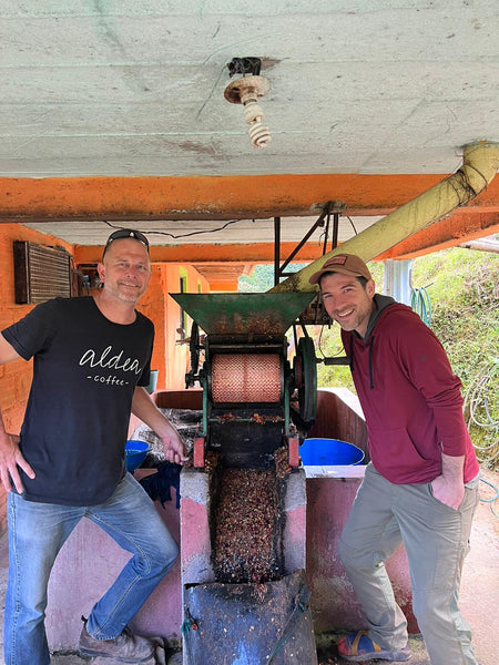Jeremy and Scott at the coffee mill in Colombia.