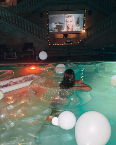 Girl Watching Film In Pool 