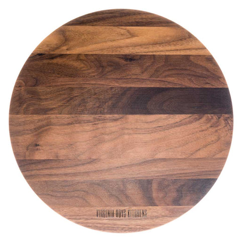 round walnut wood cutting board with unique grains