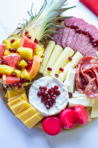 charcuterie beautifully arranged on a round board