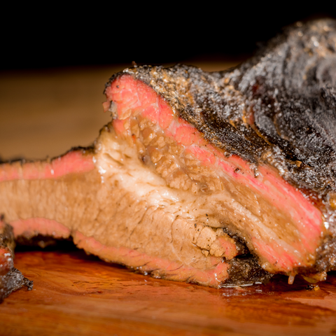 cross-section of sliced, cooked brisket showing can you cut a brisket in half