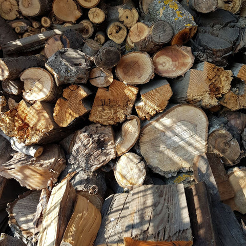 different types of hardwood in a pile