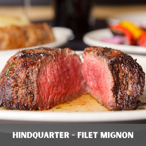 filet mignon medium rare cut in half to show the middle pink reddish color