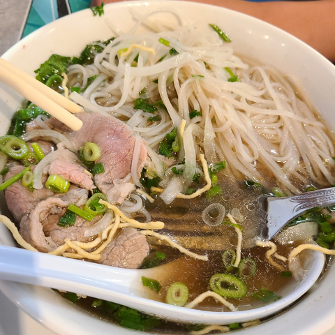 thinly sliced eye round steak in pho noodle soup