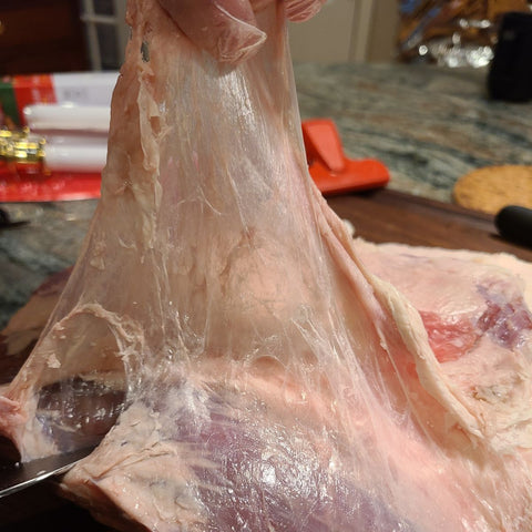 removing the silver skin or the membrane of the brisket