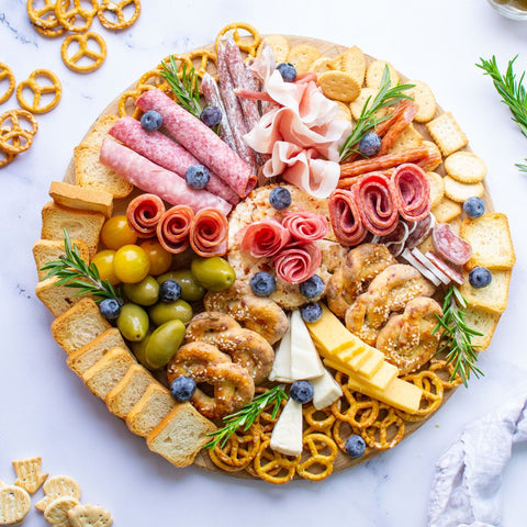 large round plate of pretzels crackers