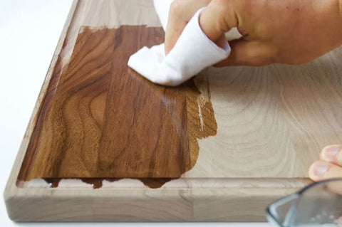 rubbing oil into cutting board with a non pilling cloth