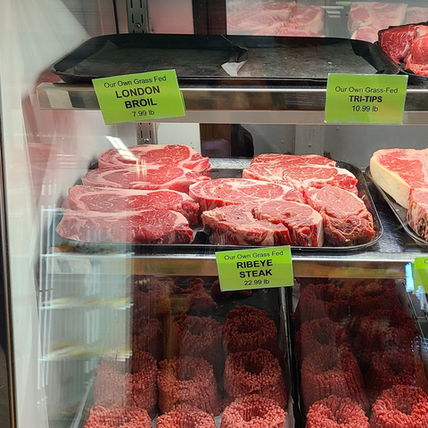 ribeye steak in butchery glass case