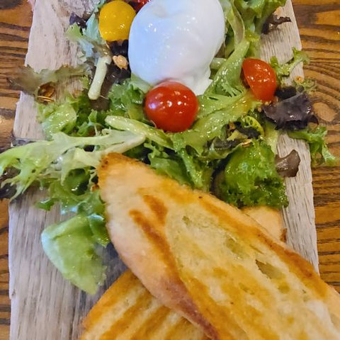 vegetarian charcuterie with salad tomatoes and cheese served with grilled bread