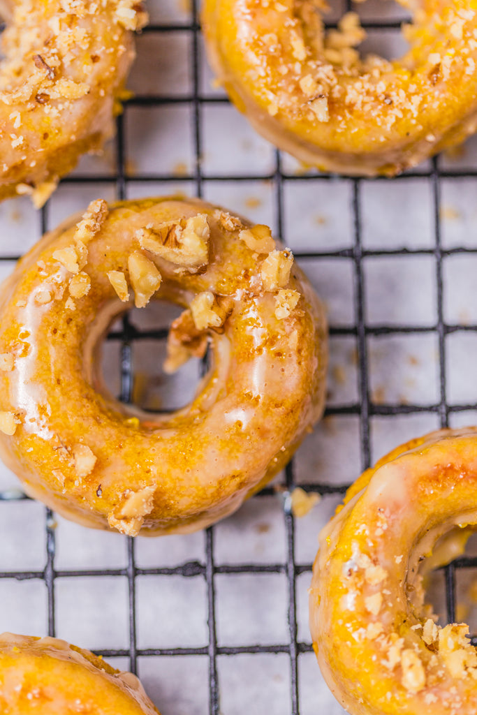 Turmeric carrot donuts with chai spiced glaze