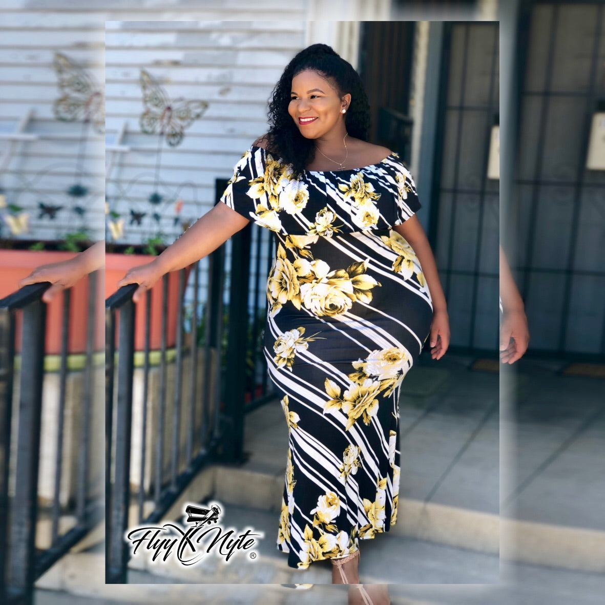 navy blue dress with yellow flowers