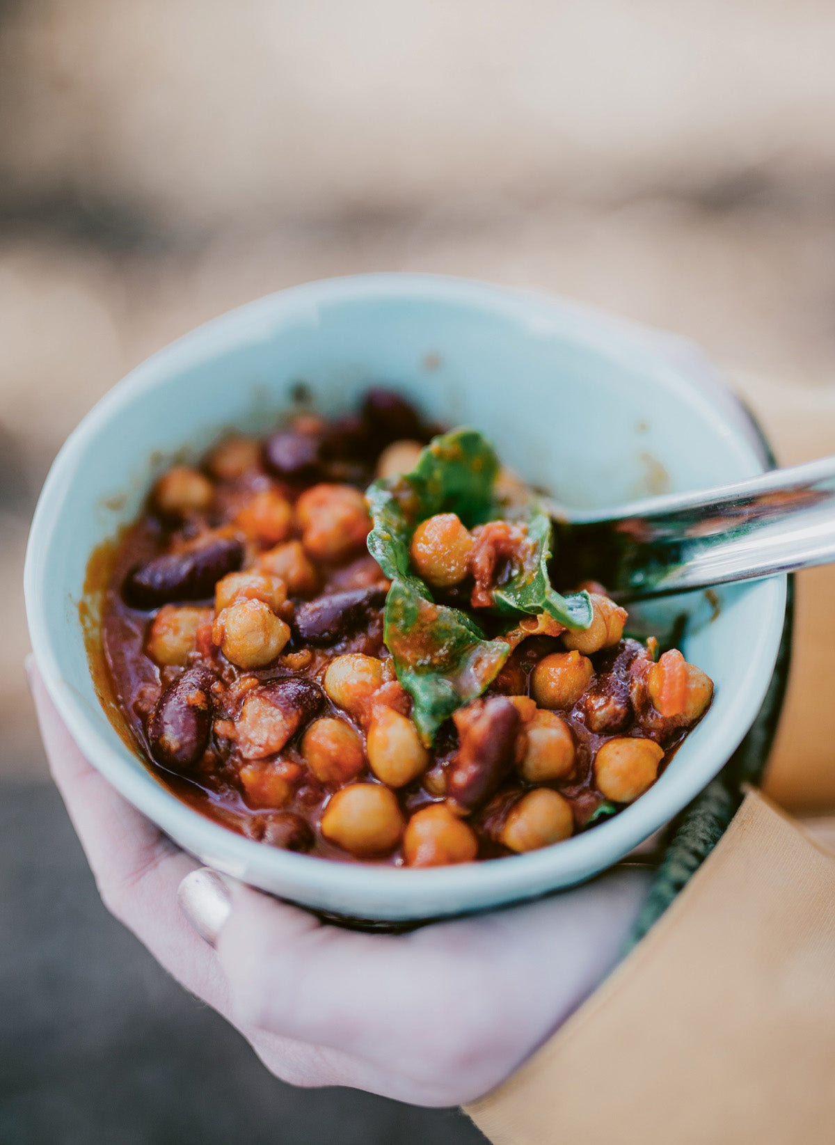 Bean stew in a pottery cup