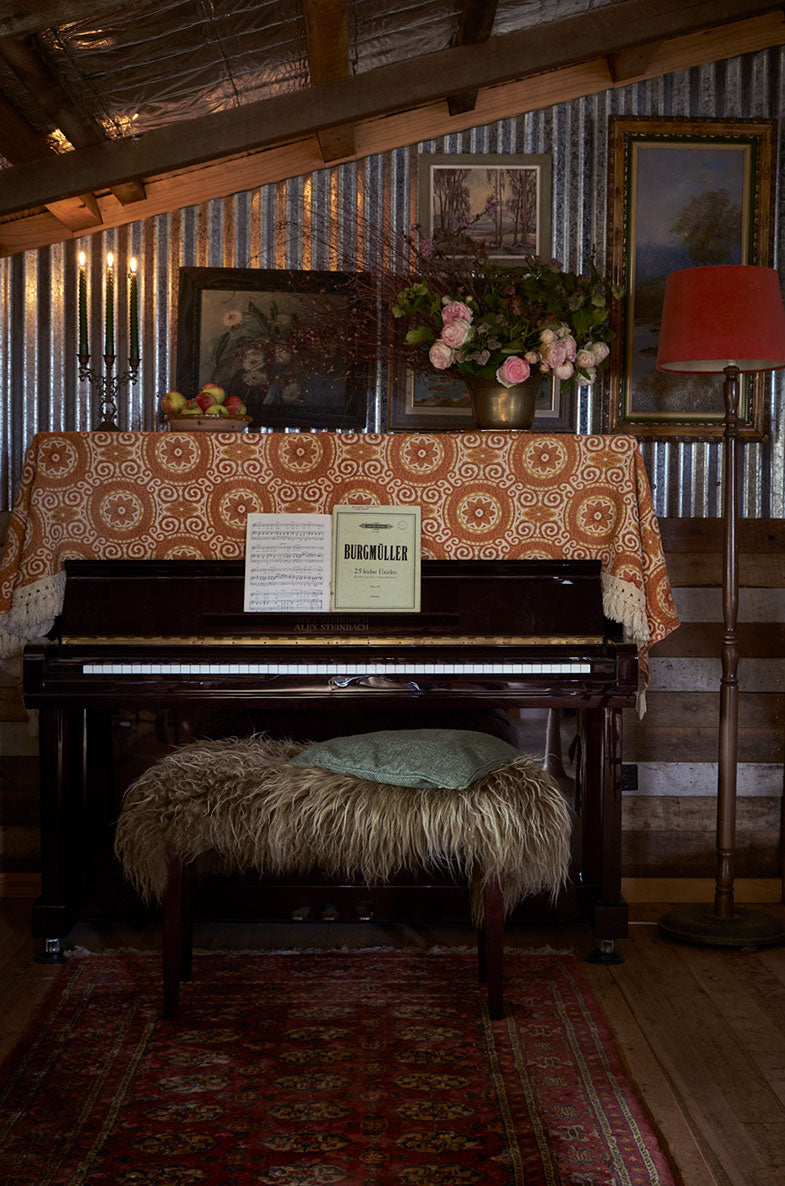 Piano in a vintage interior with antiques