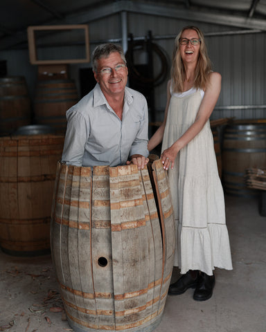 Kristal and Peter with an old wine barrel