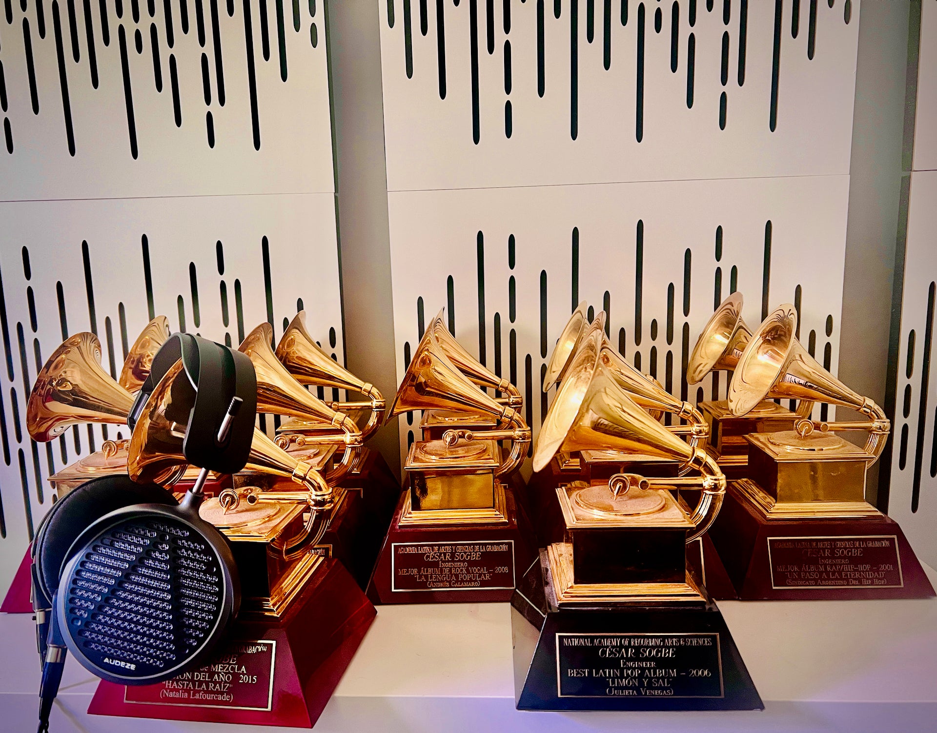 MM-500 Headphone On Grammy surrounded by multiple Grammys