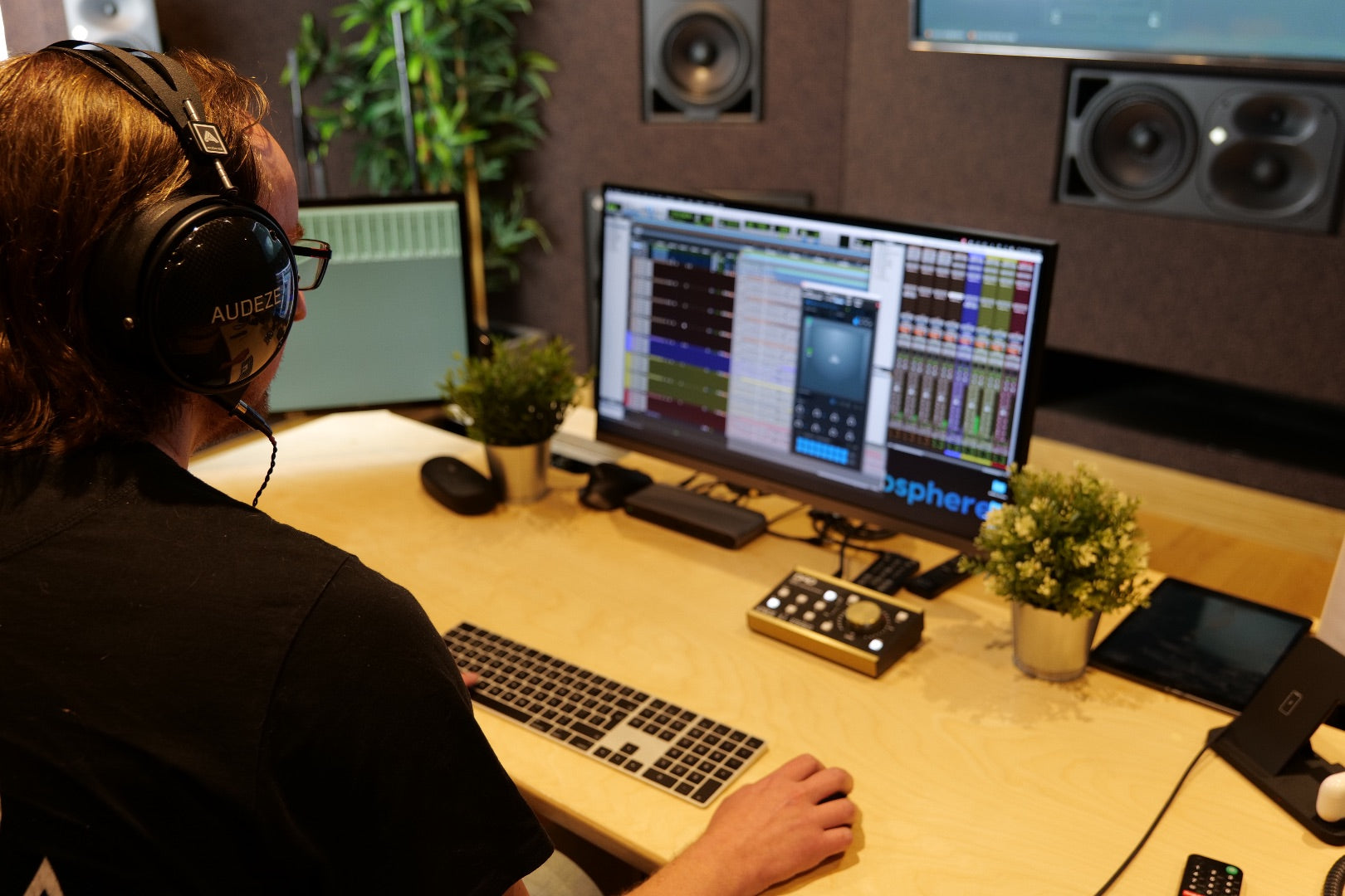 Mike Hillier in his studio wearing Audeze LCD-XC headphones