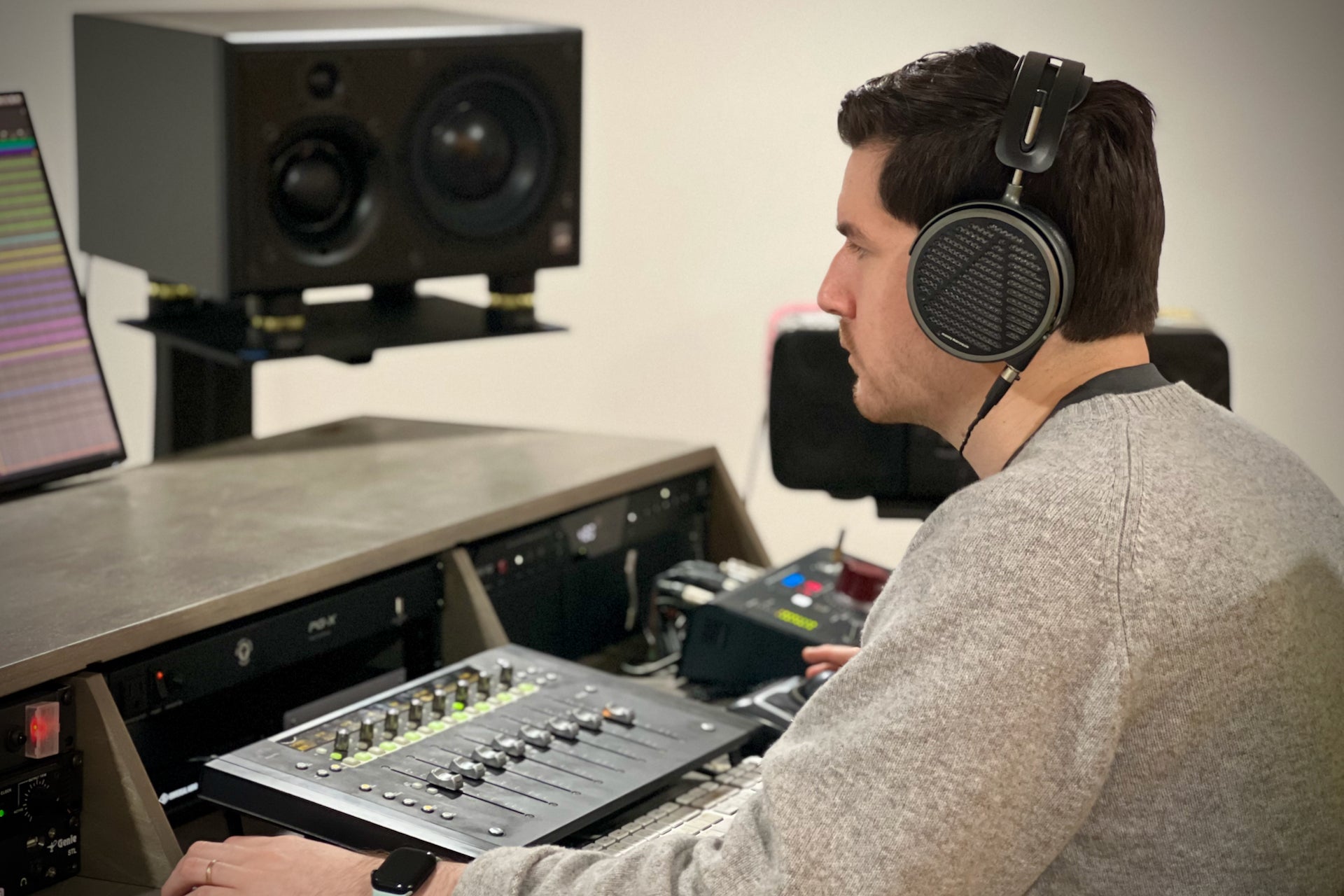 Fernando Reyes in the studio with his Audeze MM-500 headphones