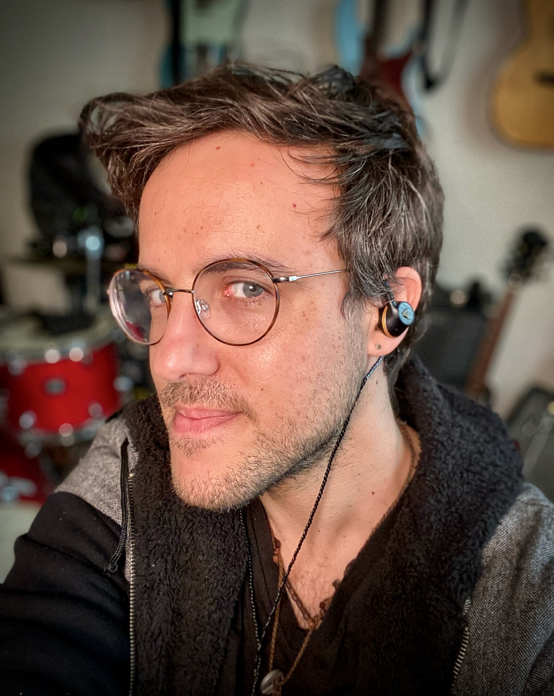 Composer Gilad Hekselman poses with his Audeze Euclid