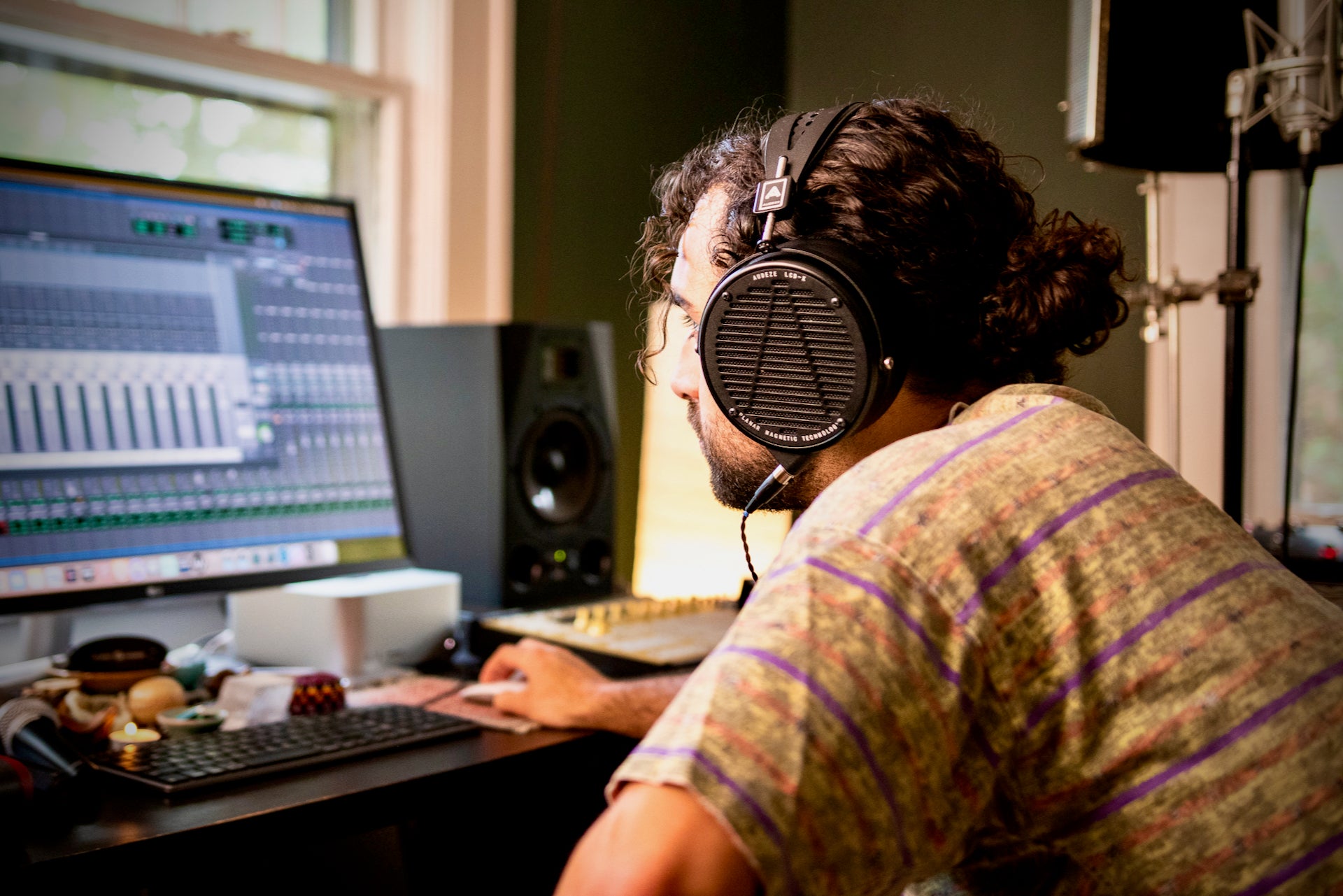 Jacob Klein in the studio with his Audeze LCD-X headphones