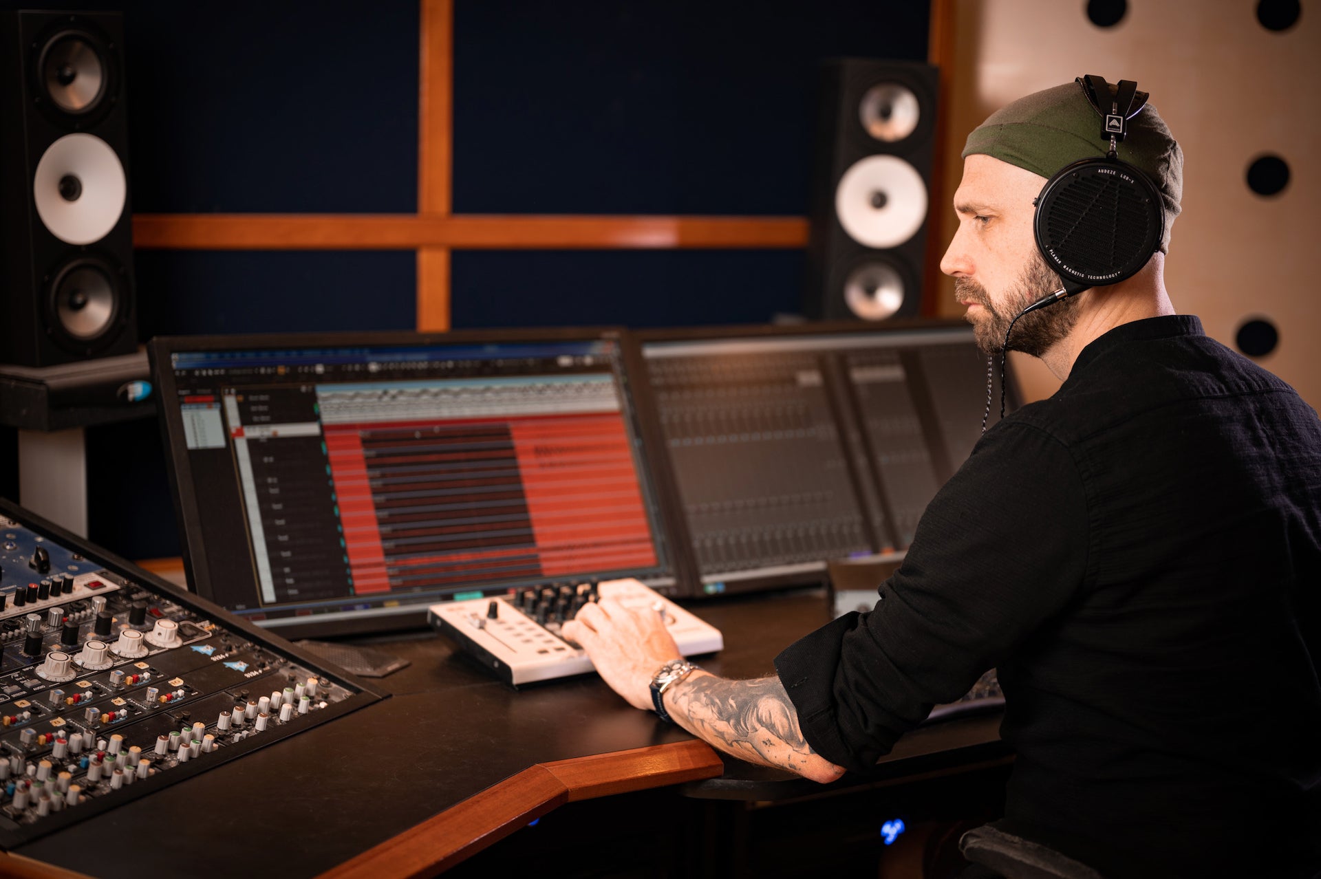 Kristian "Kohle" Bonifer in the studio with his Audeze LCD-X headphones