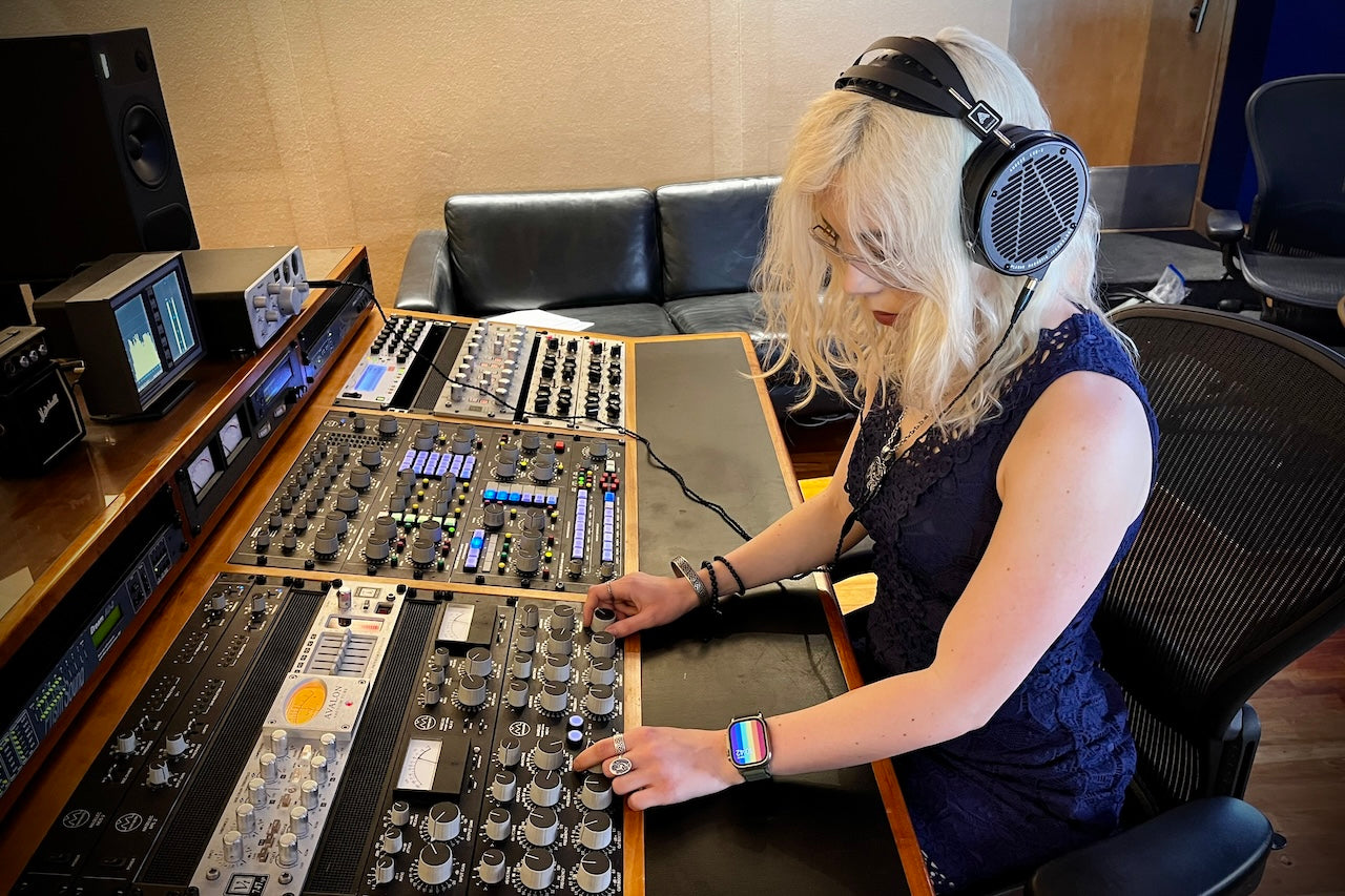 Natalie wearing Audeze LCD-X headphones mixing