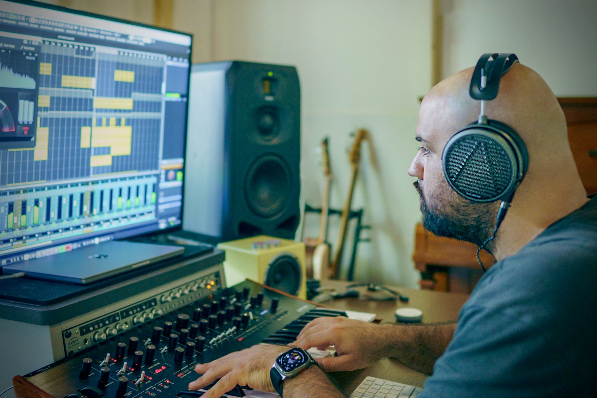 Nikolaos Giannulidis in the studio with his Audeze MM-500 headphones
