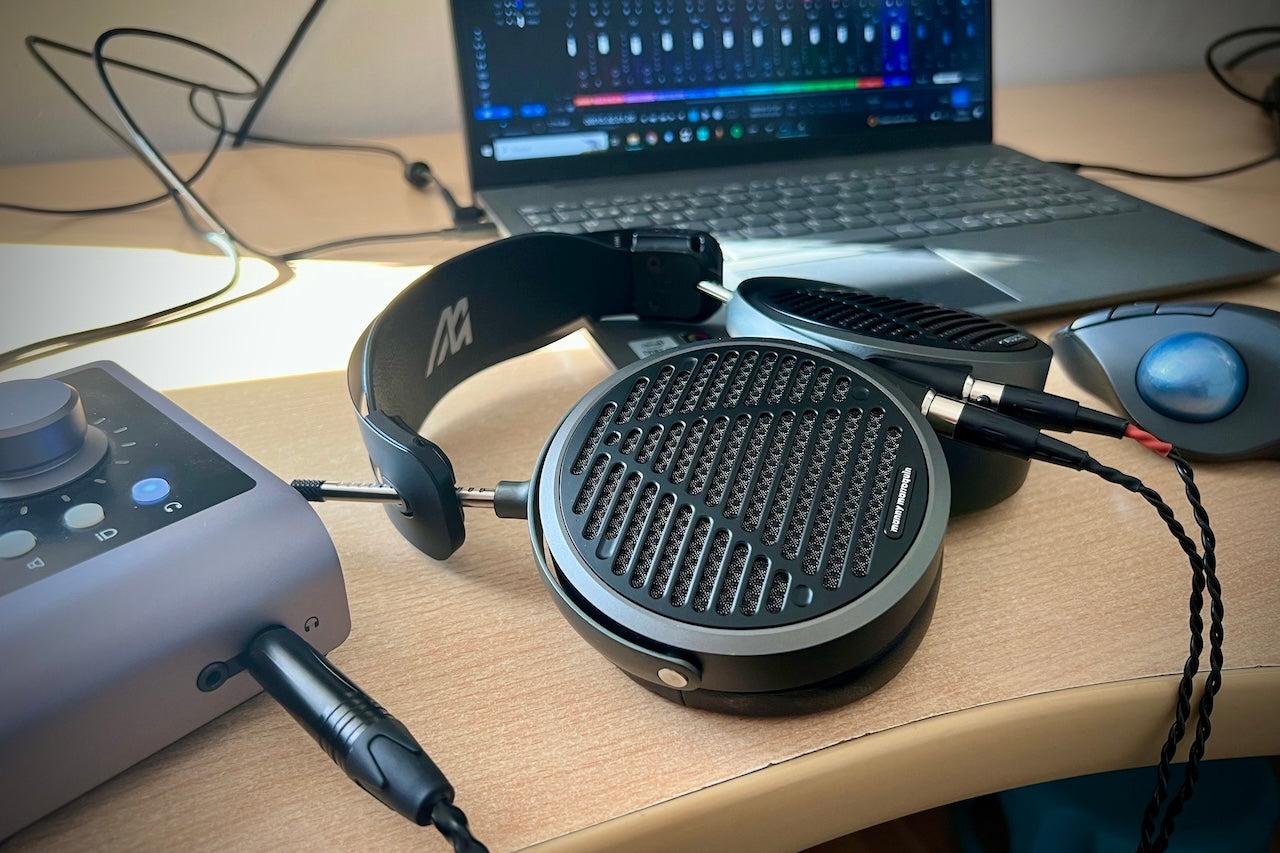 Audeze MM-500 headphones laying on workstation
