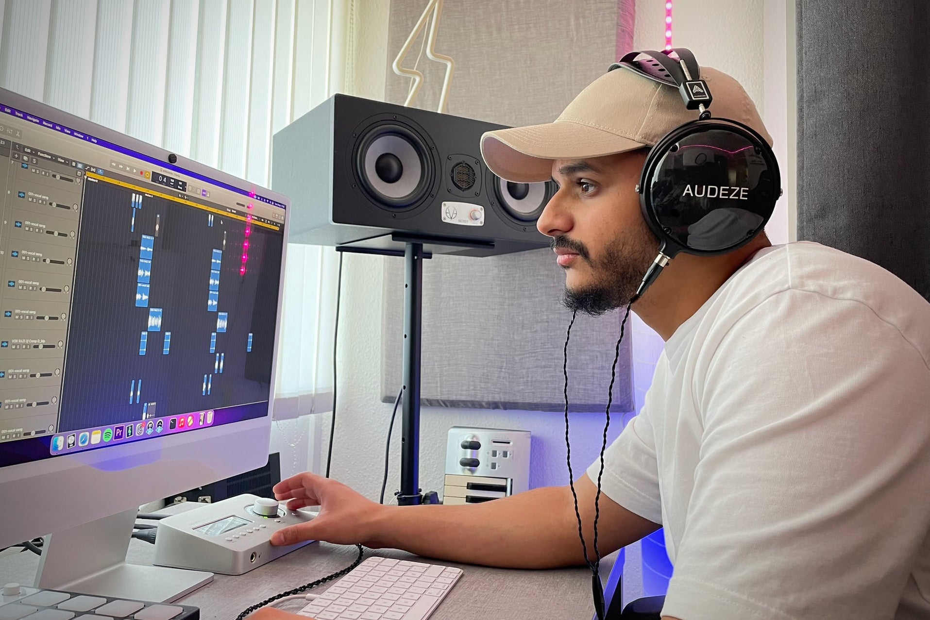 Razi Irawani in the studio with his Audeze LCD-2 Closed Back headphones