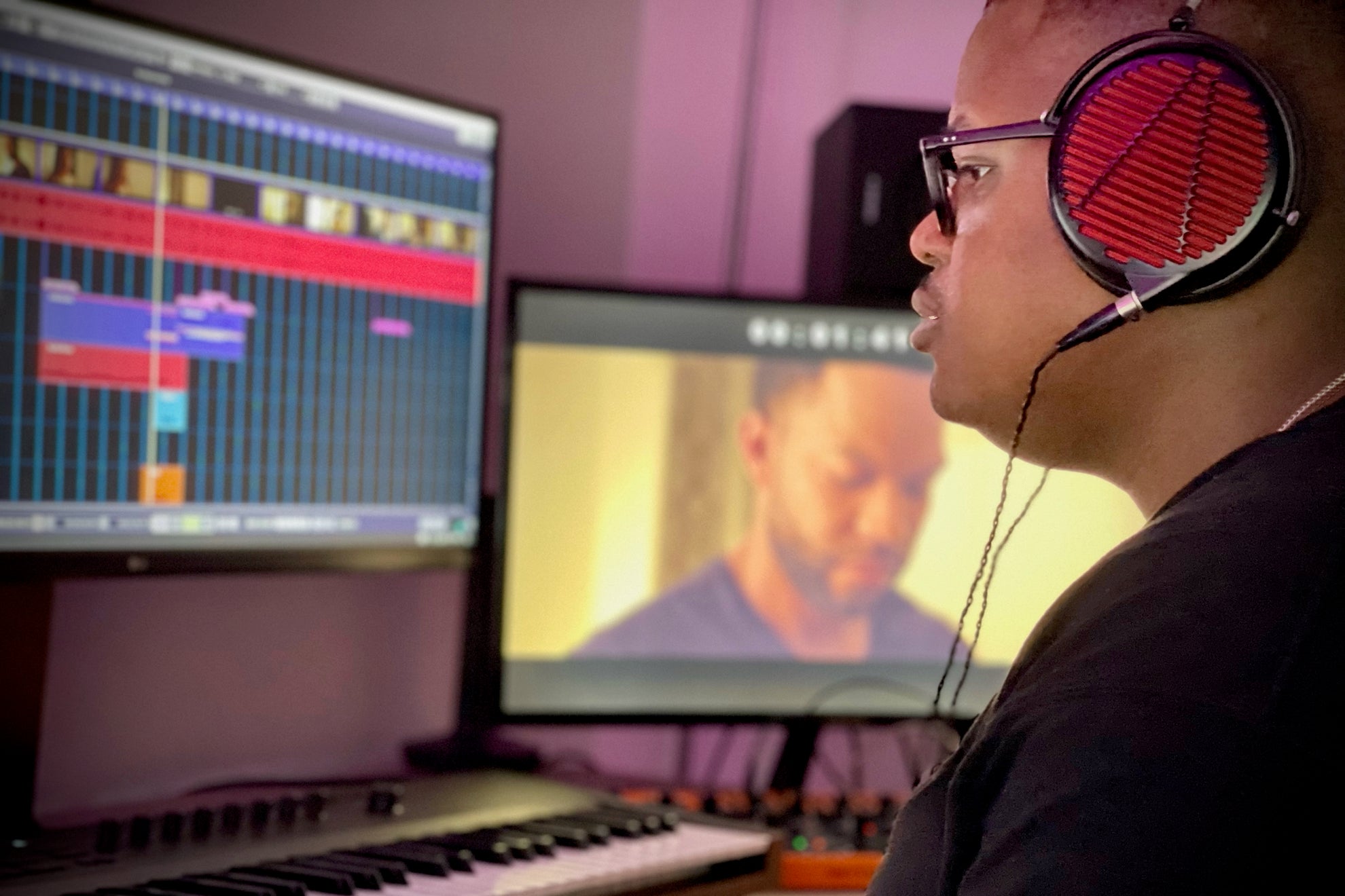 Rayshaun Thompson working on a film with his Audeze LCD-GX headphones