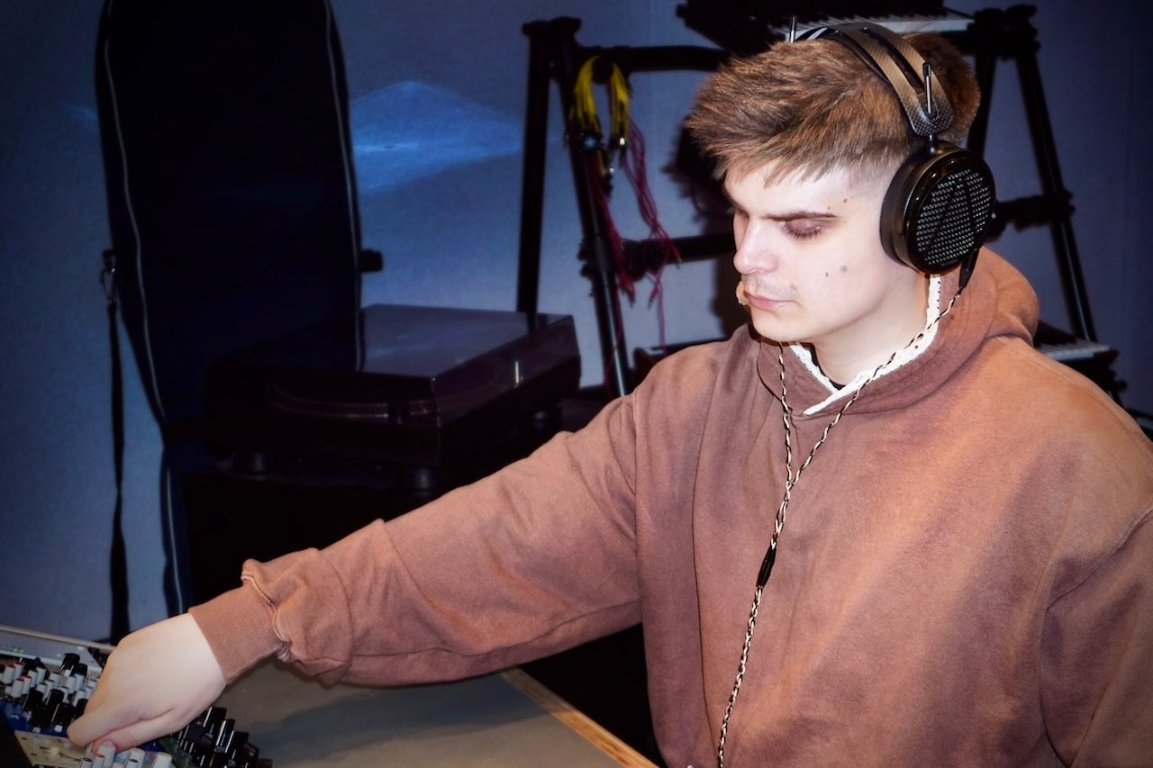 Sune Søgaard Hansen wearing Audeze LCD-5 headphones