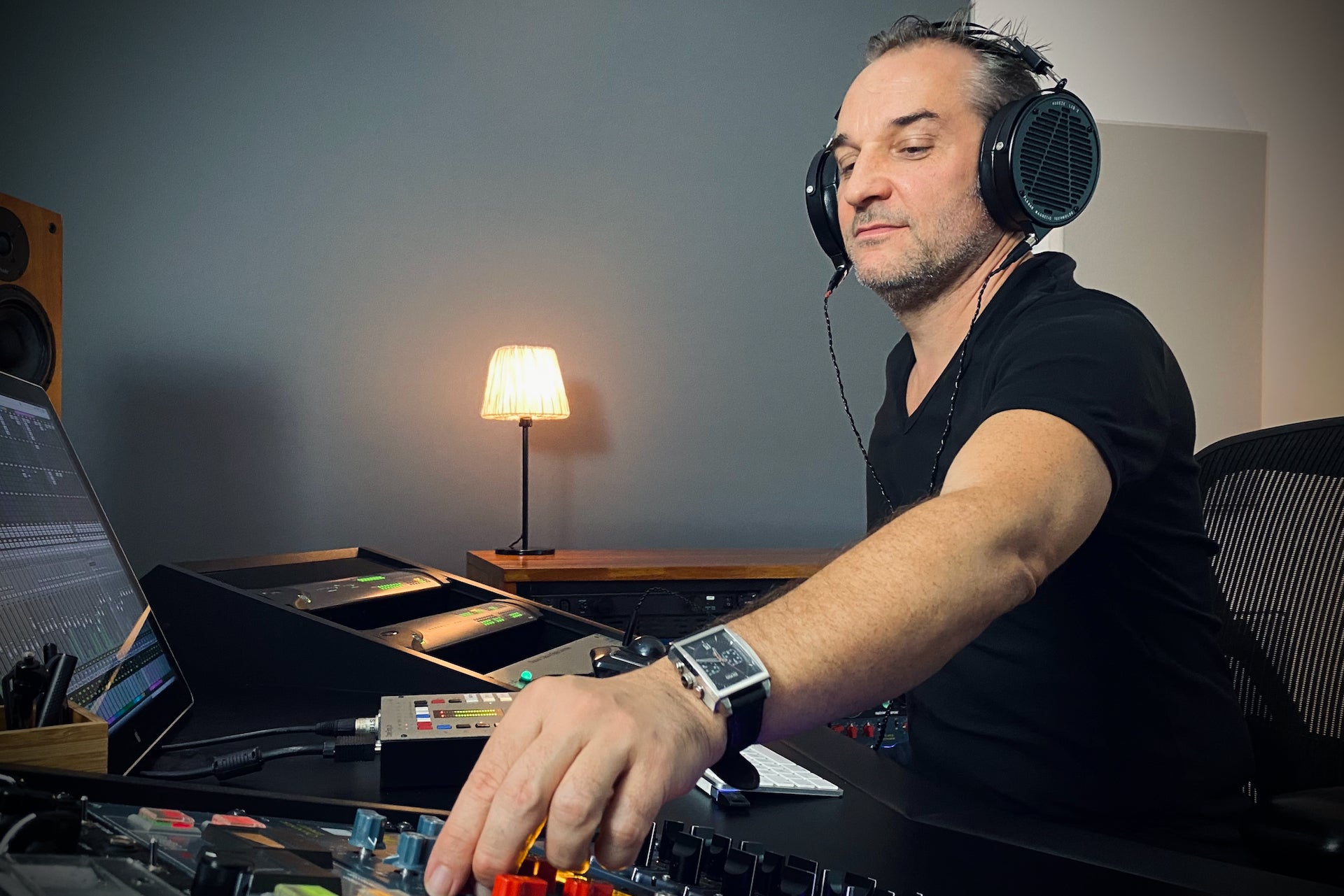 Stéphane Piquemal in the studio with his Audeze LCD-X headphones