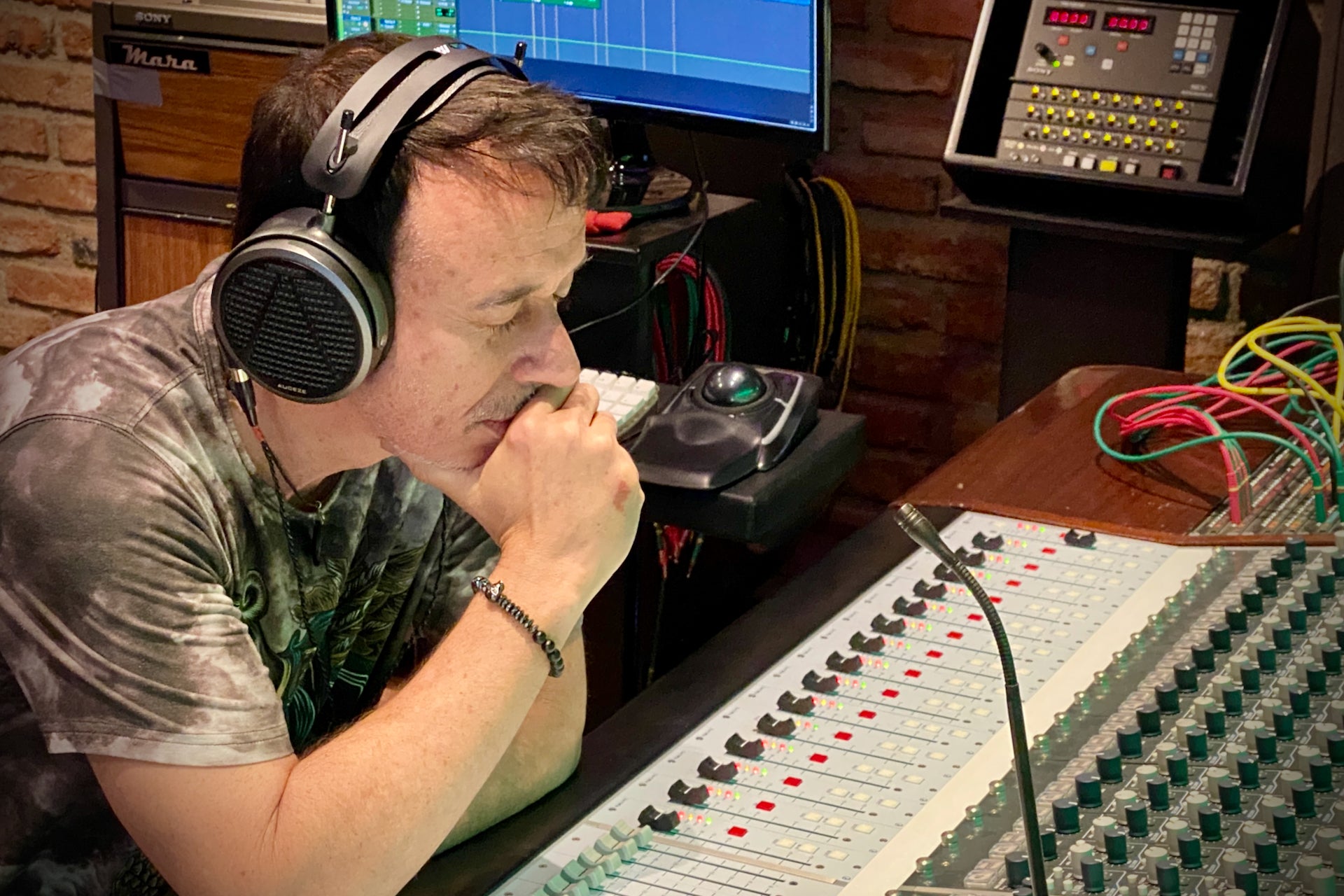 Sacha Triujeque in the studio with his Audeze MM-500 headphones