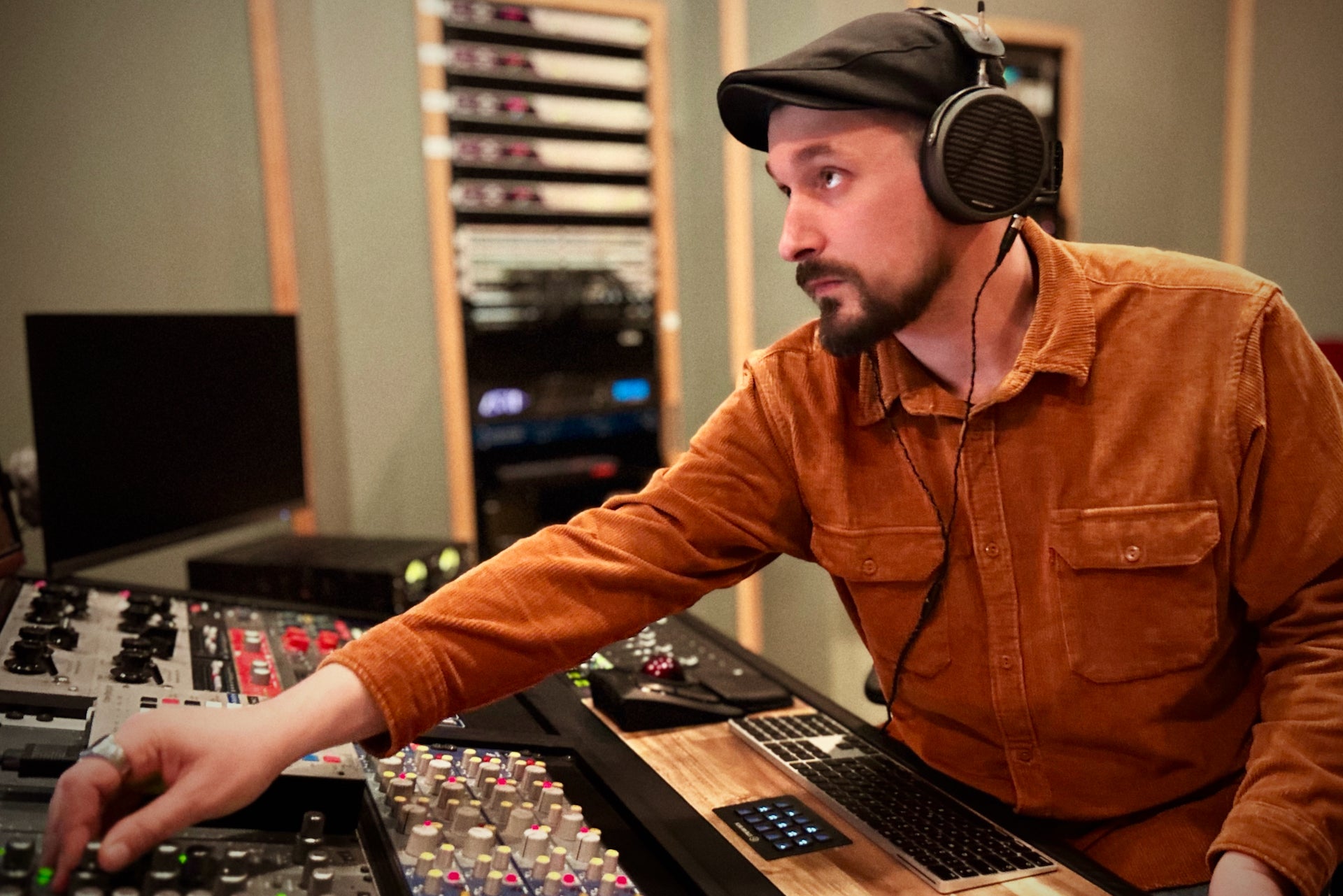 Thomas Gloor wearing Audeze MM-500 Headphones in his Studio