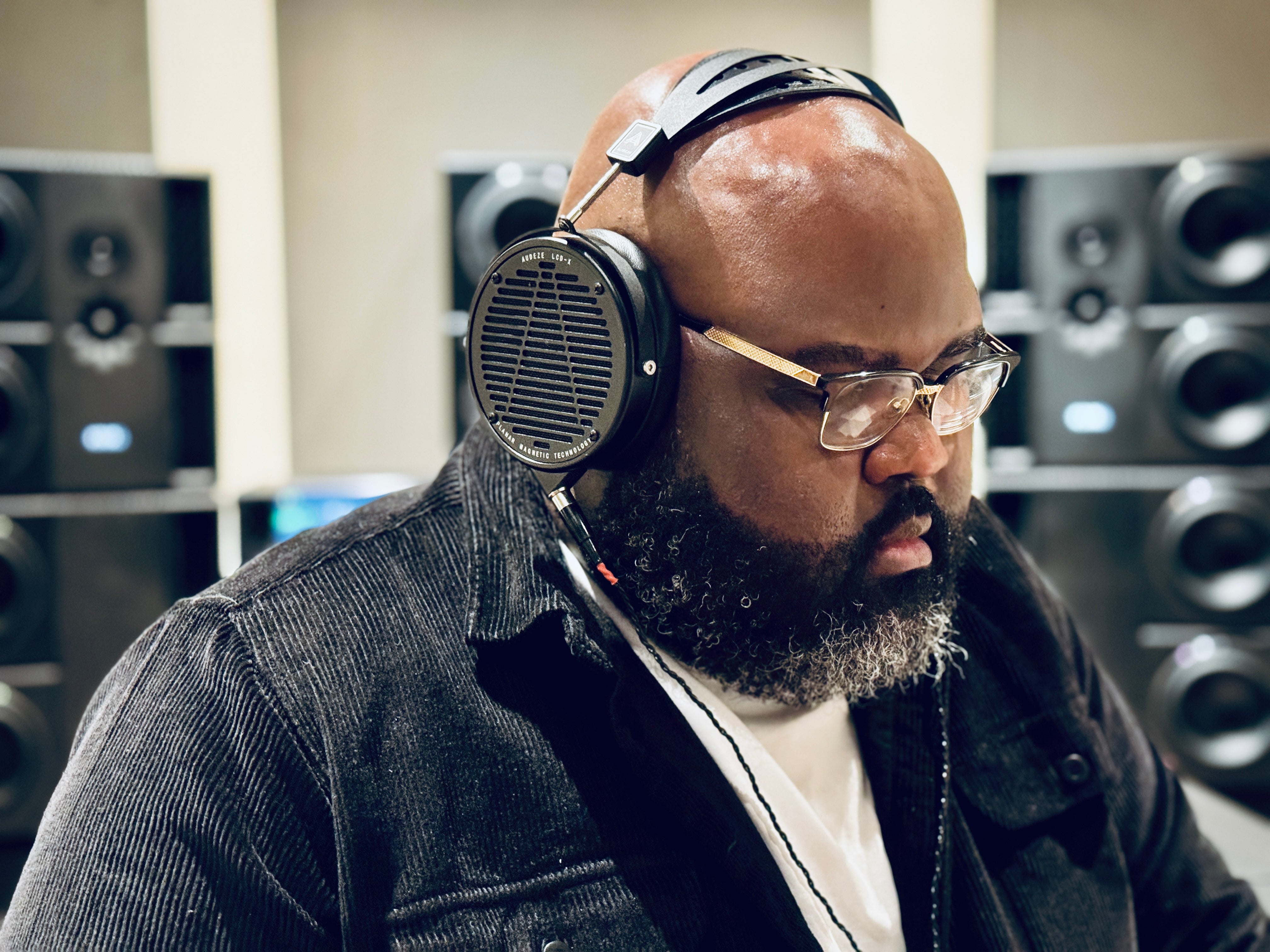 Tyler Scott wearing Audeze LCD-X headphones in the studio