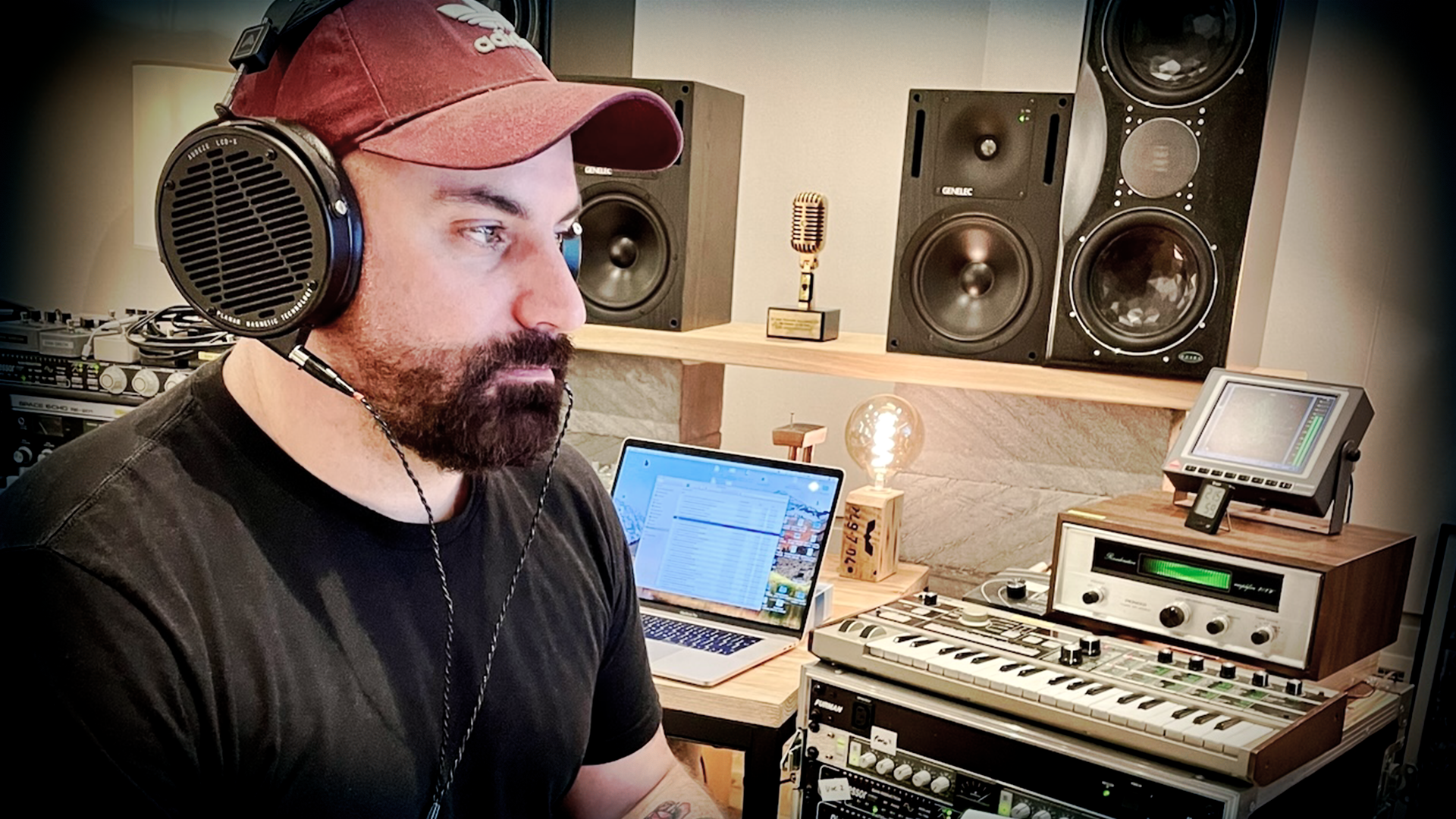 Dan Grech wearing Audeze LCD-X headphones