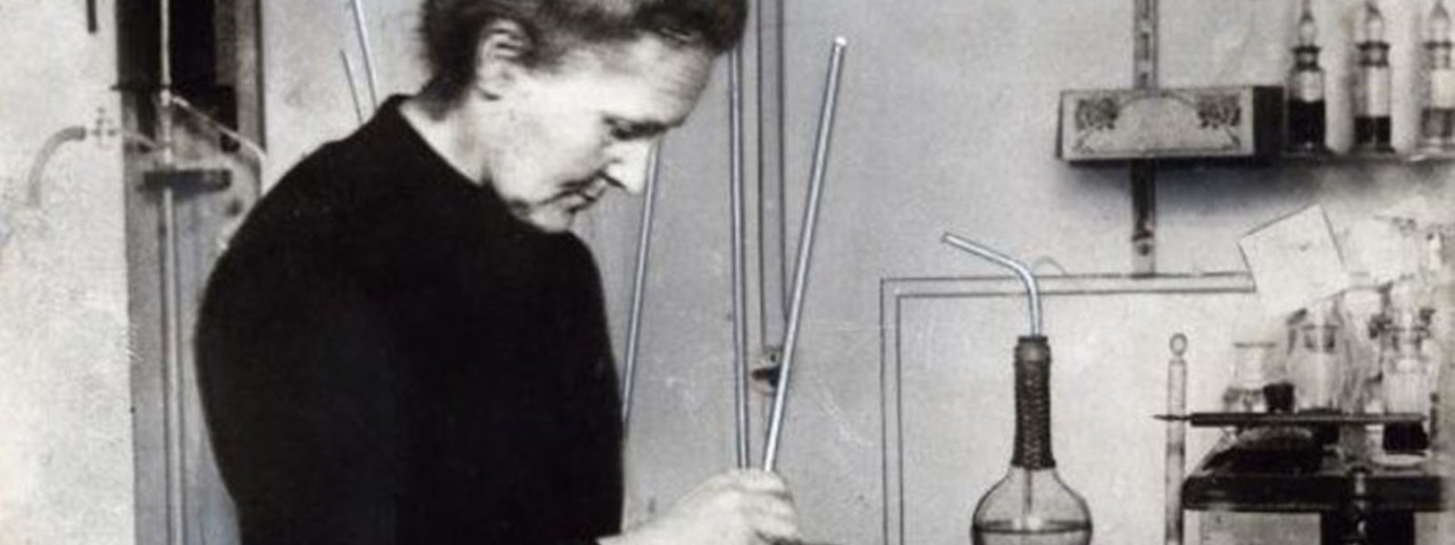 Beautiful Equations Blog - 3 Inspirational Women in Science. An old black and white photograph of Marie Curie in her laboratory.