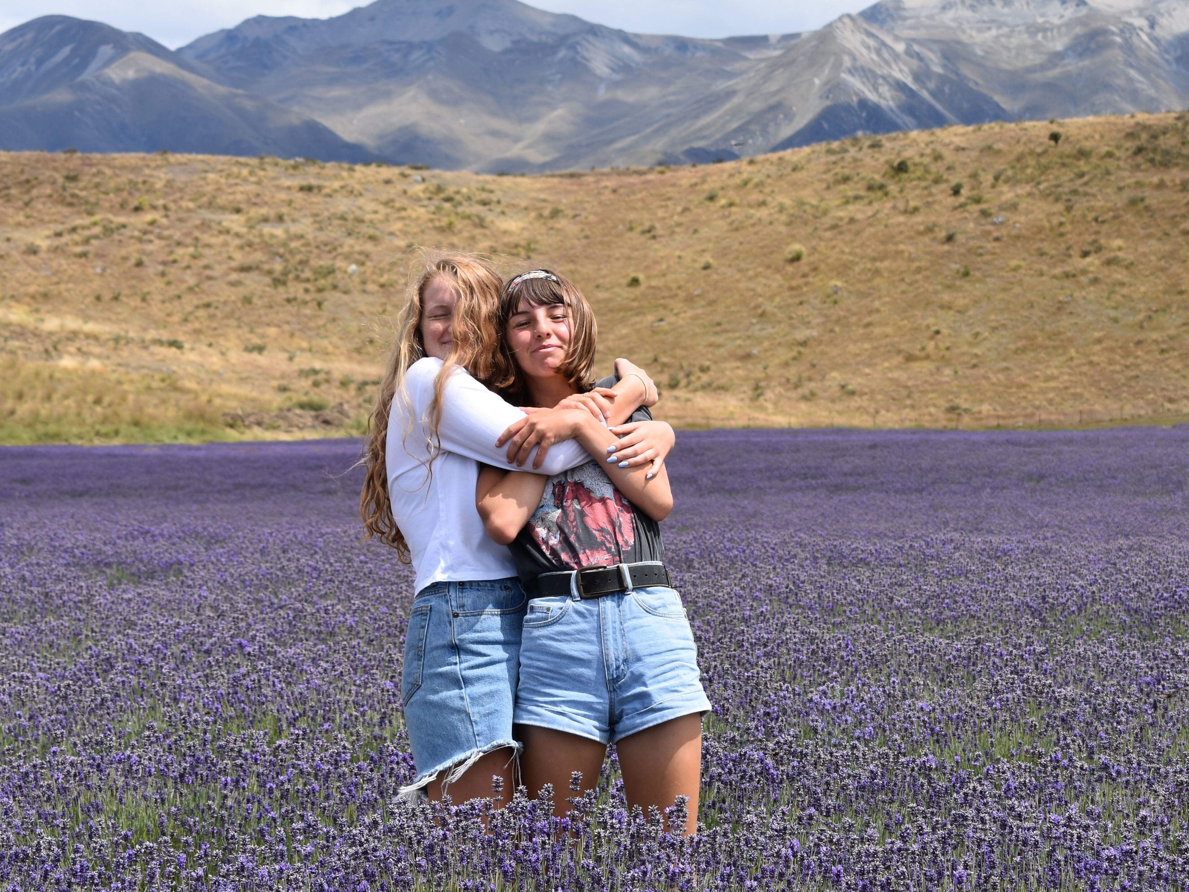 Sisters Hugging in a Lavender Field - Sibling Photoshoot Idea