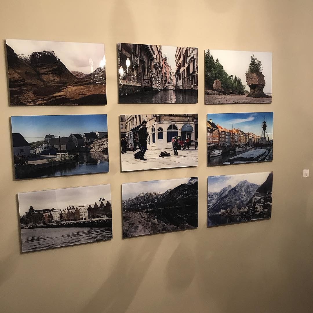 Gallery Wall Display Featuring 9 Acrylic Prints Hanging on the Wall