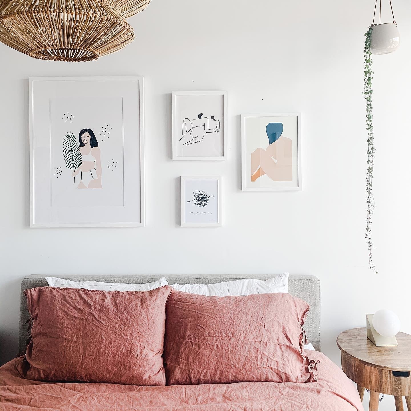 Bedroom Gallery Wall of White Framed Prints