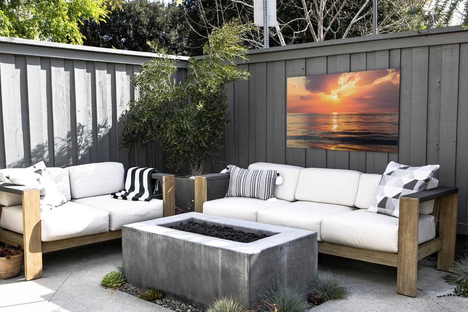 Metal Photo Print of Ocean Sunset Displayed Outdoors on a Patio 