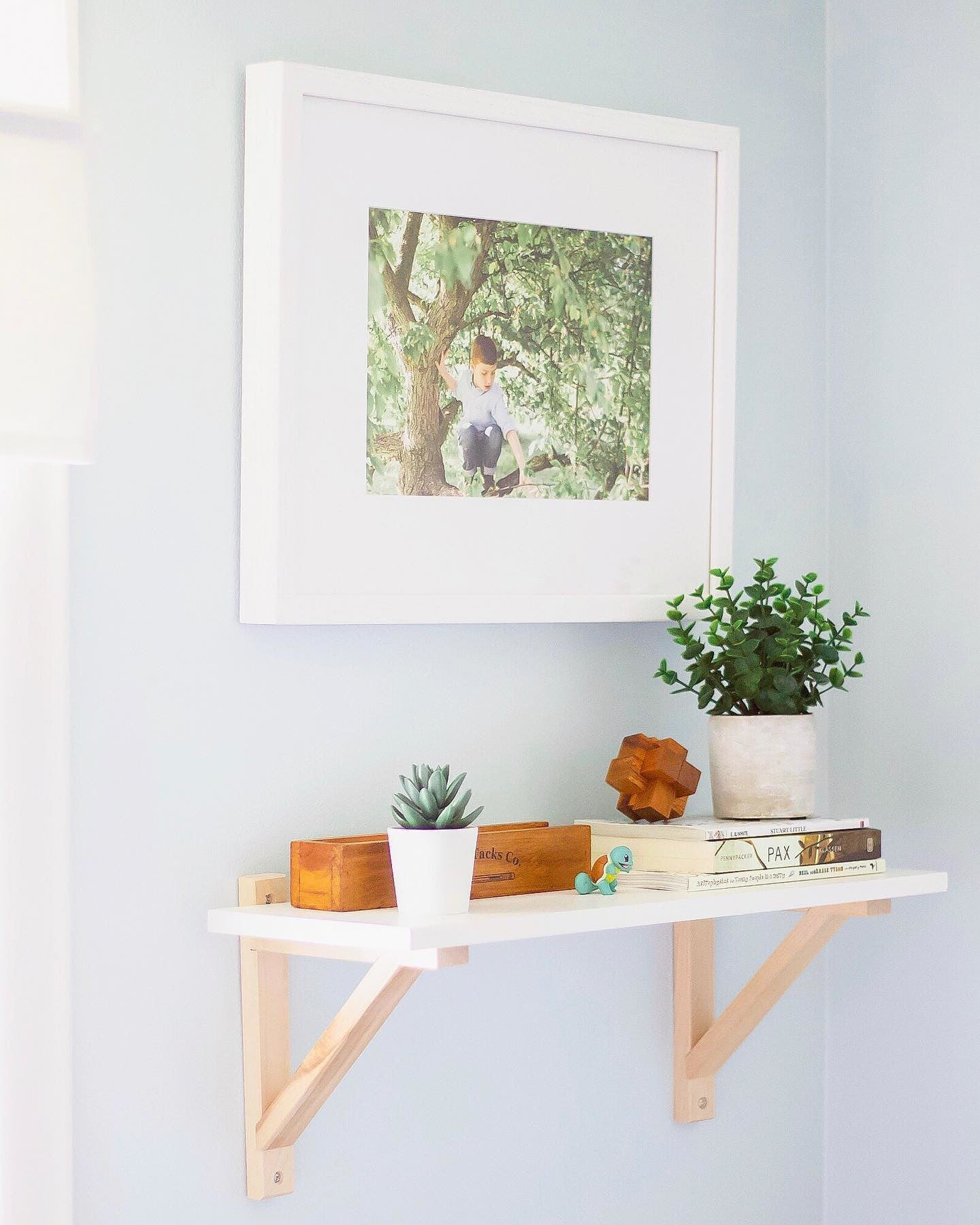 Photo Print on Display in a White Frame