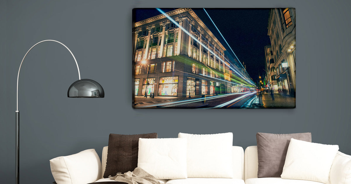 Urban photo on large Canvas Print by Posterjack Canada displayed above a living room couch.