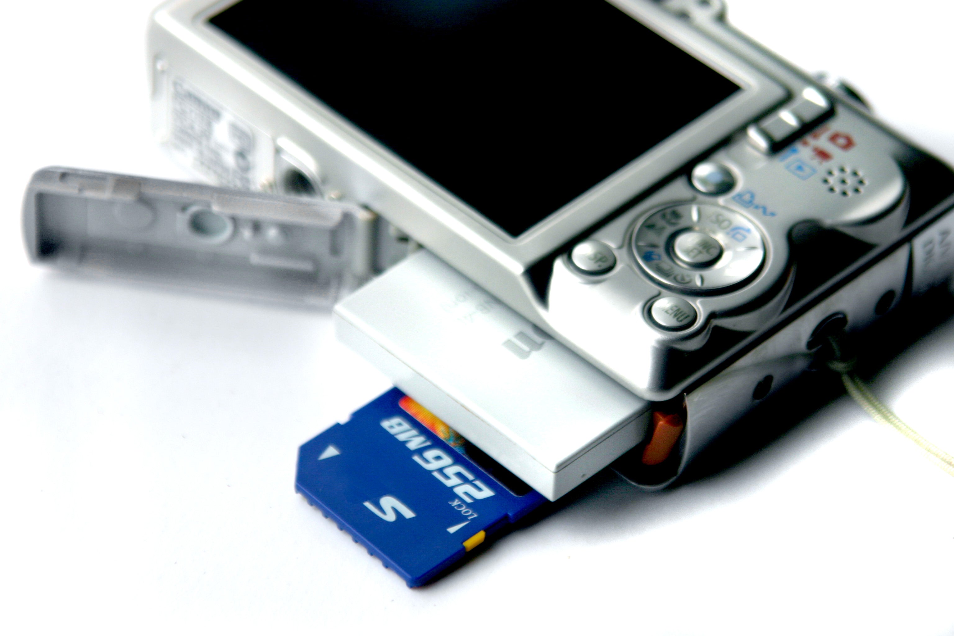 Digital camera with battery and memory card