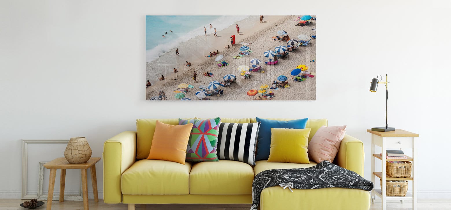 Large Acrylic Photo Print of Beach Scene Displayed Above a Couch